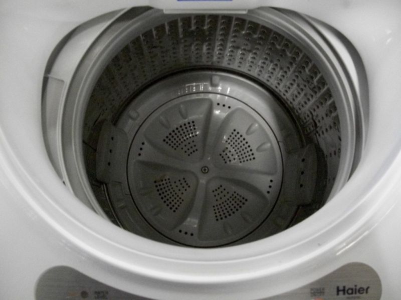 cleaning a top loading washing machine